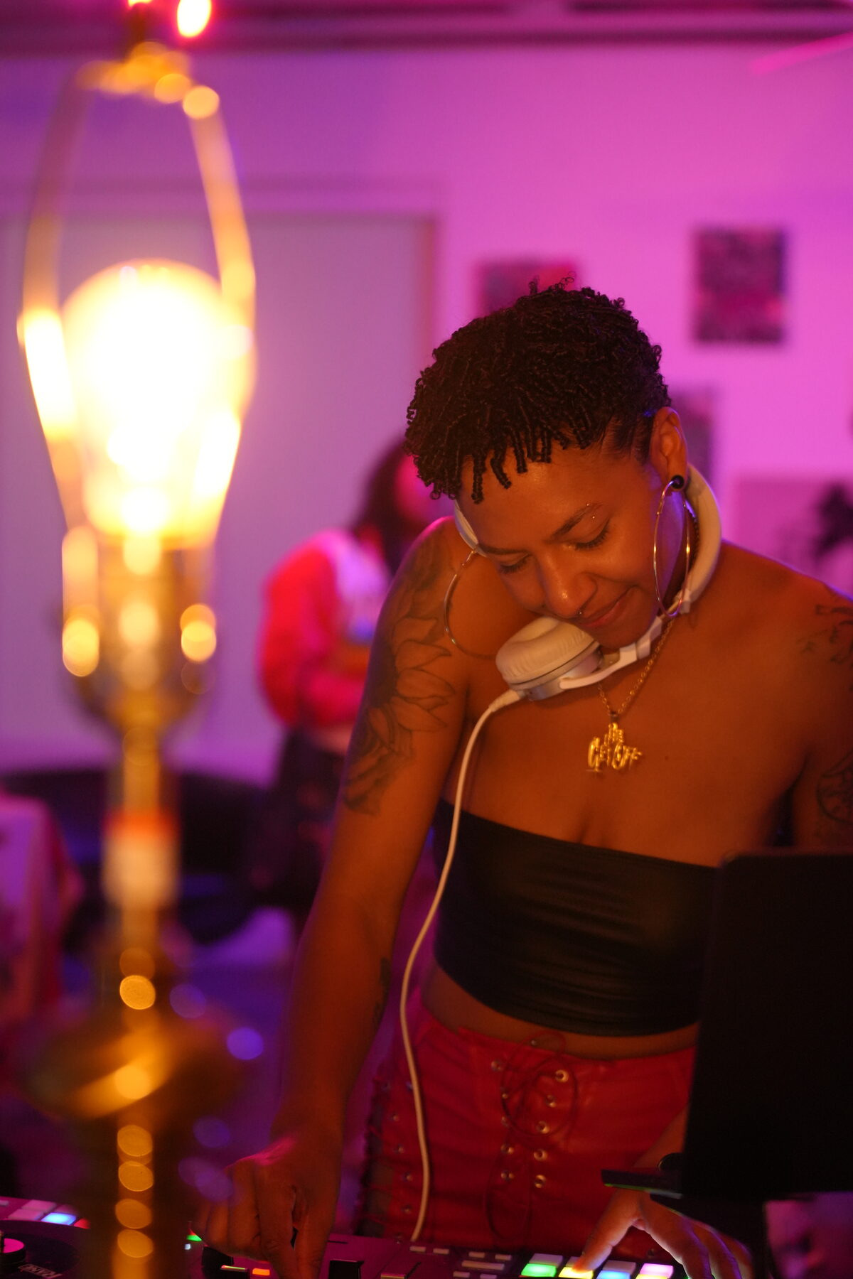 DJ Mahay laughing with a collaborator